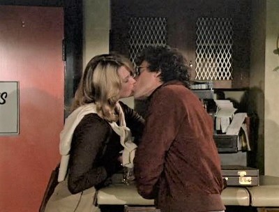 Melanie Griffith and Paul Michael Glaser share a kiss